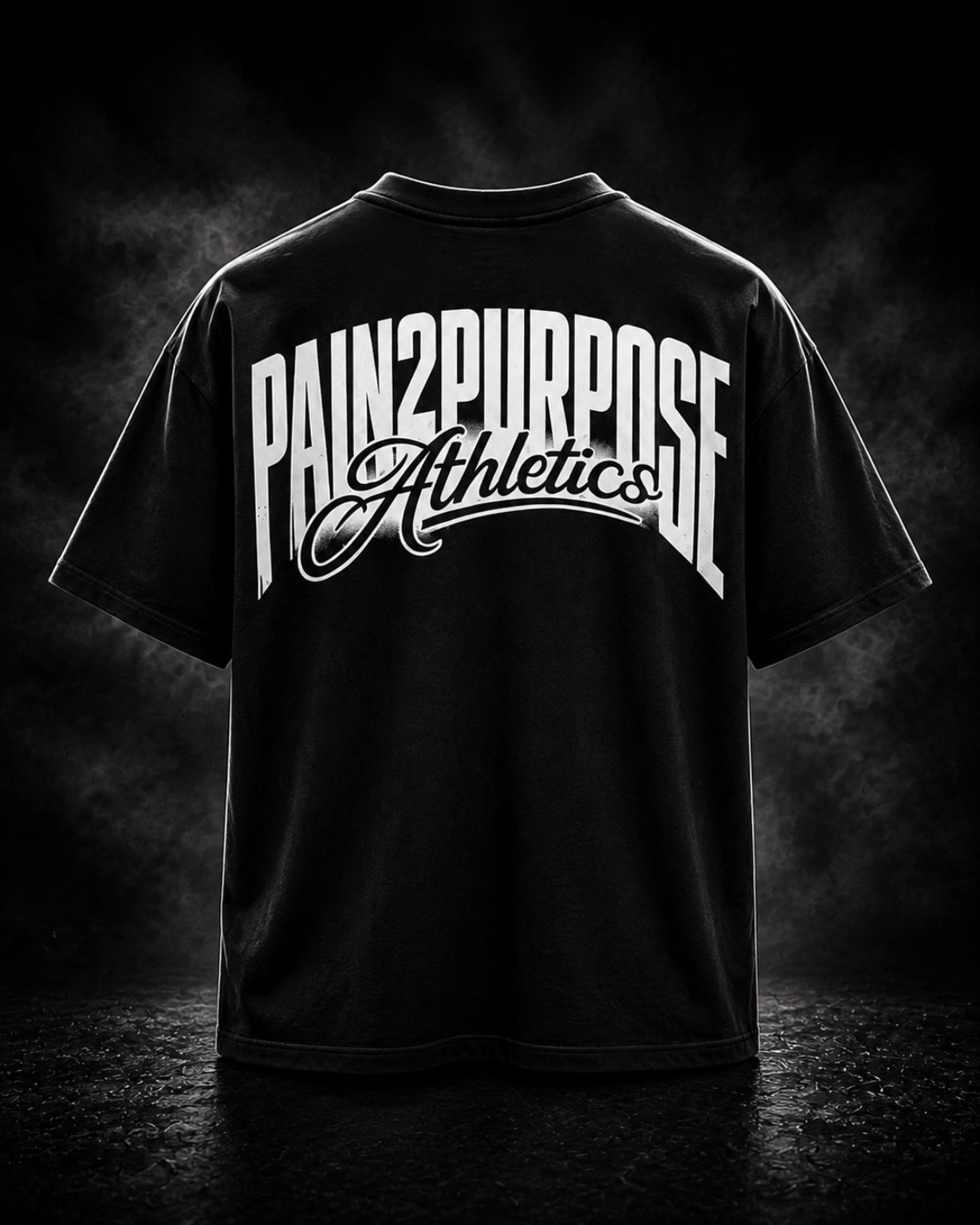 Back view of The Standard black T-shirt with a large white Pain2Purpose Athletics logo